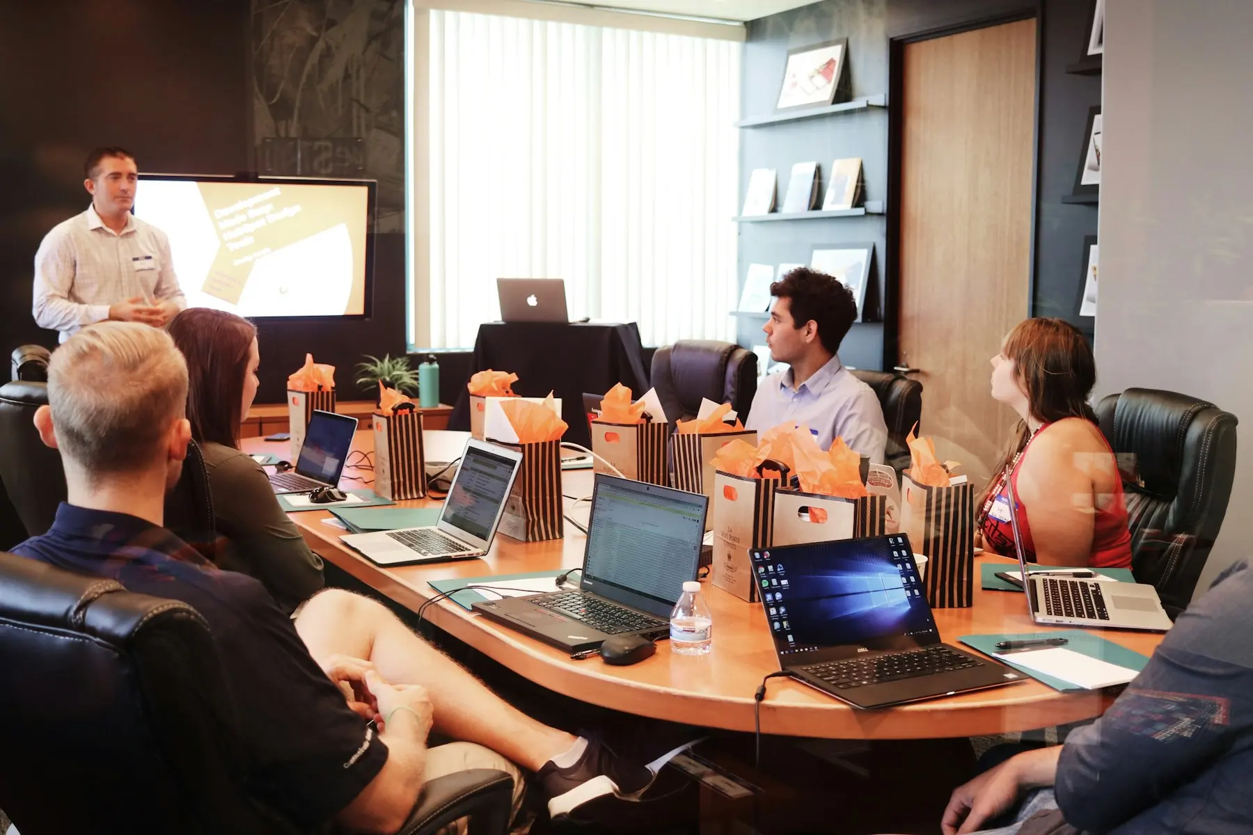 Logistics team reviewing shipment plans together in a meeting