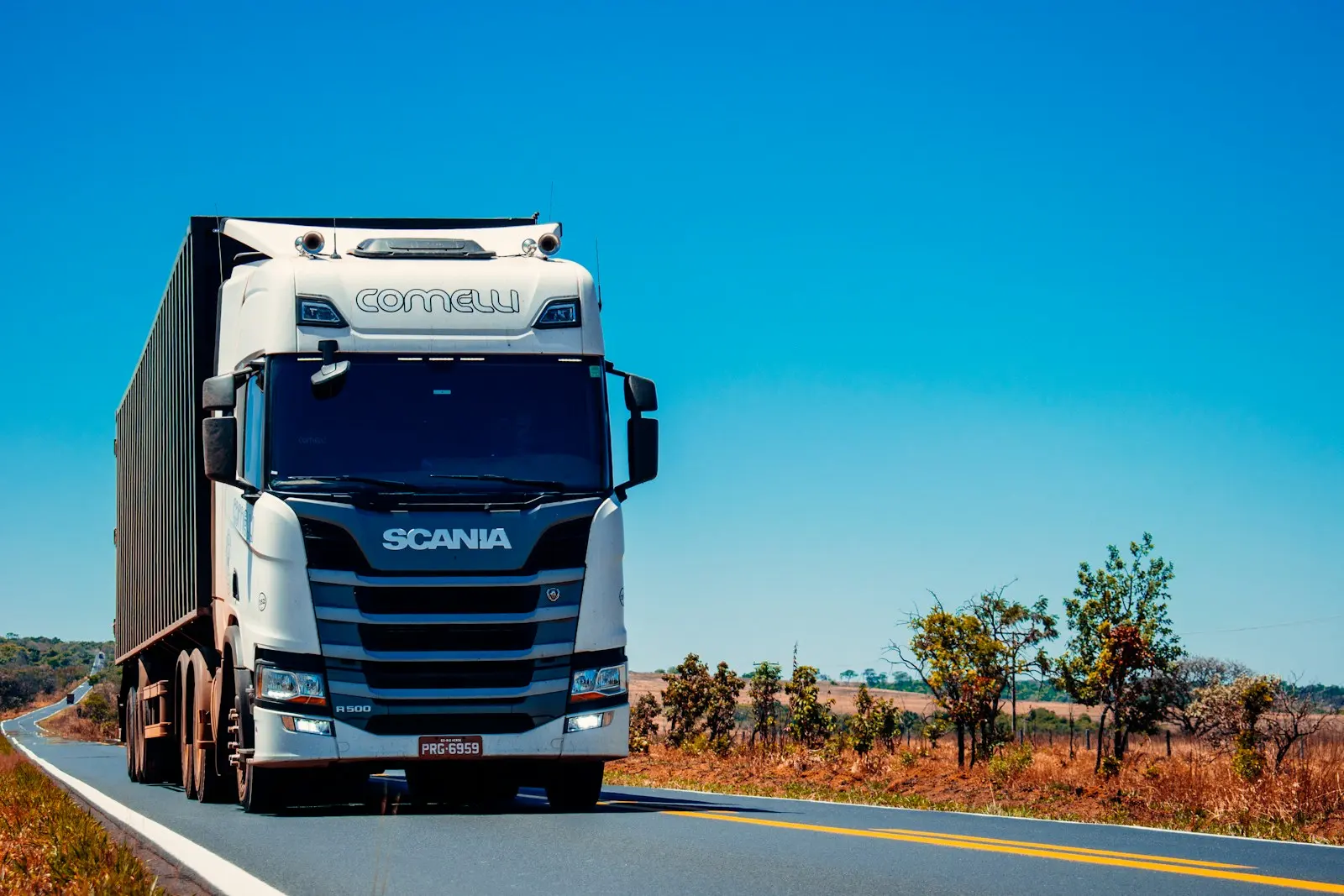 Heavy goods vehicle travelling along a highway
