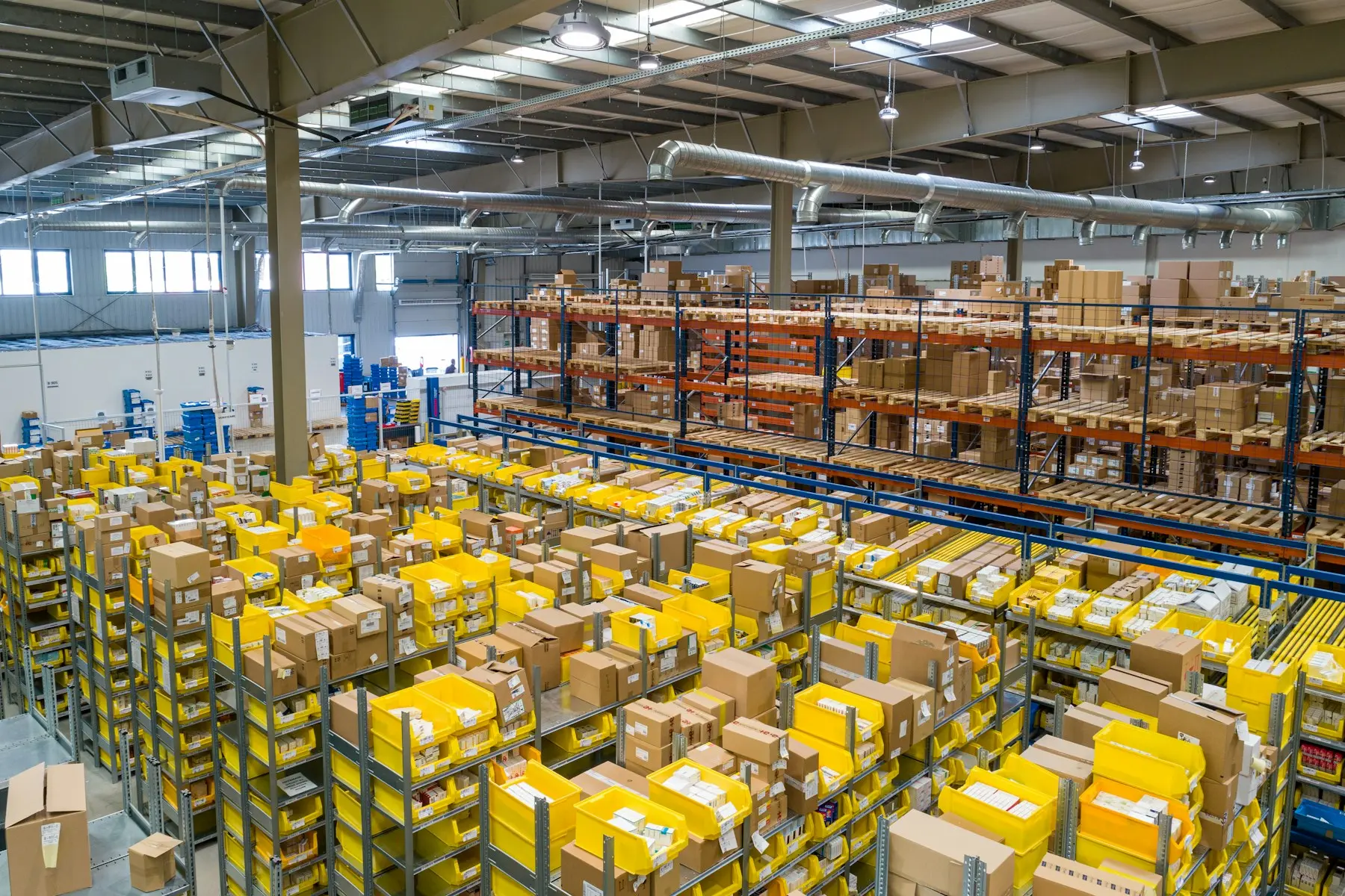 Palletised cargo arranged inside a logistics warehouse