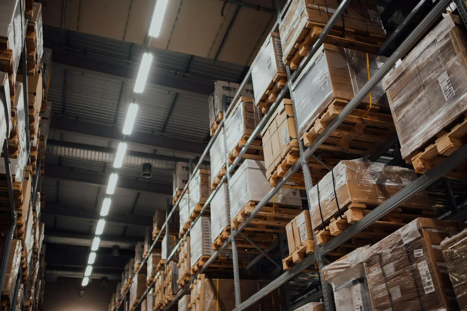 Industrial warehouse racking filled with palletised goods
